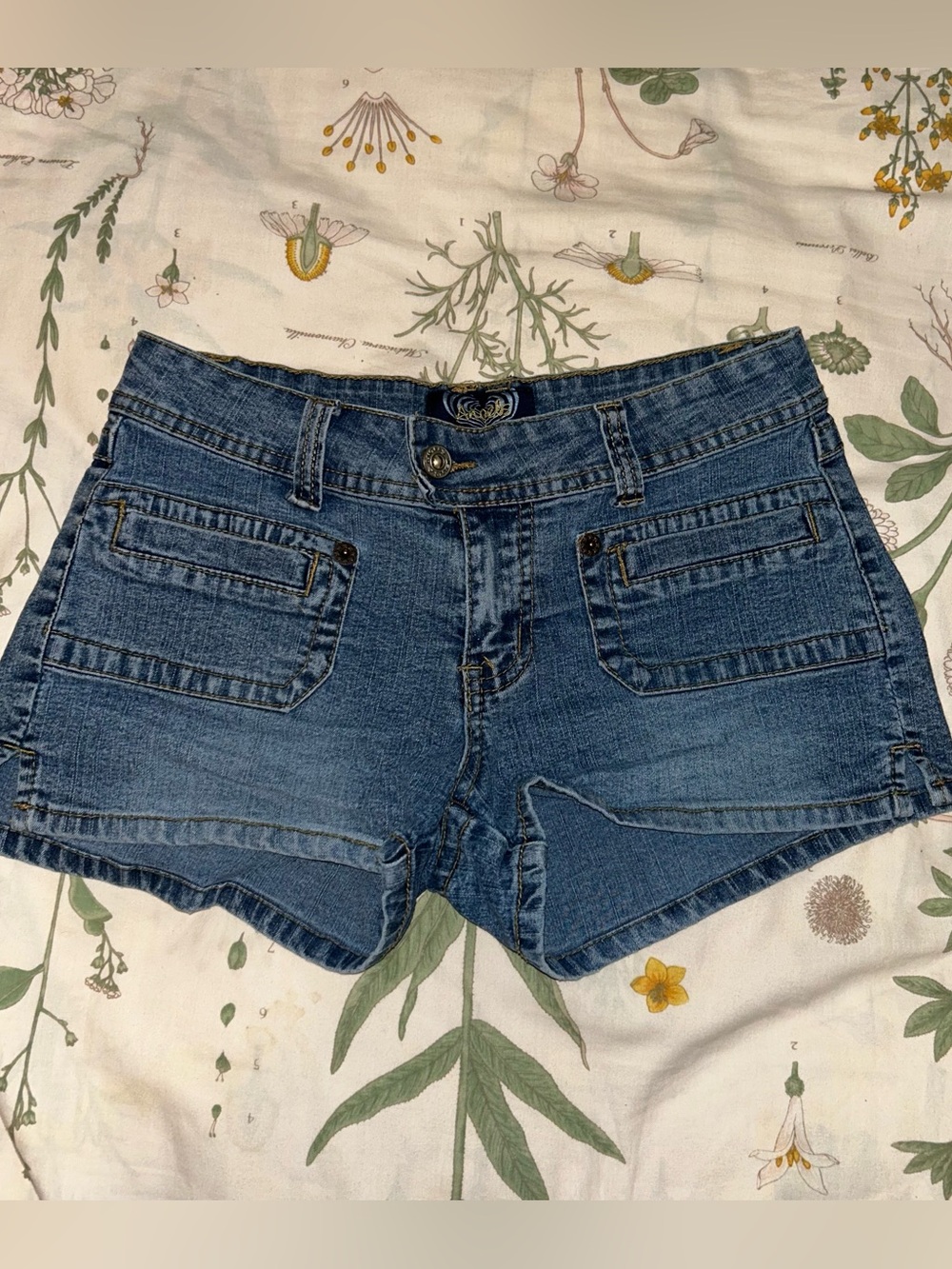 Y2K Angels blue denim shorts with low rise fit